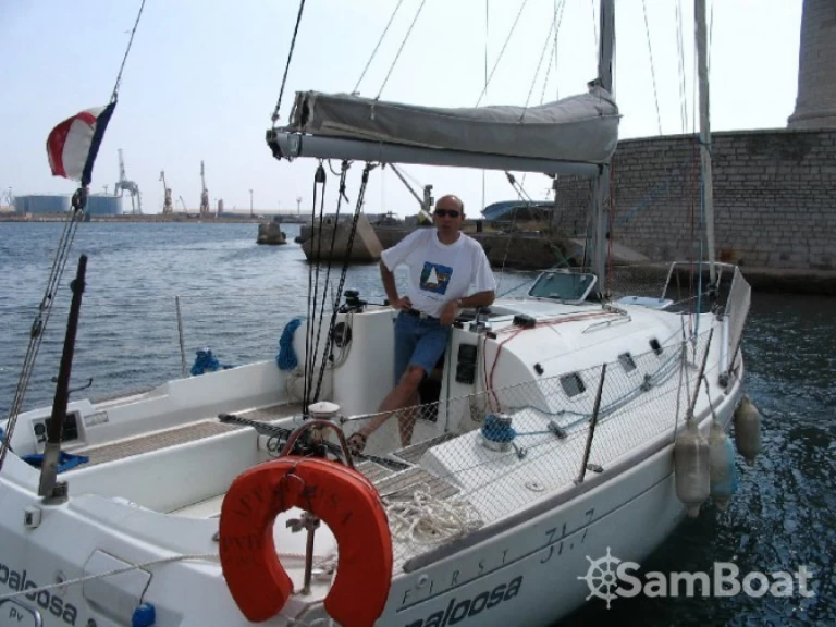 Bénéteau First 31.7 charter bareboat or captained in  Mauguio