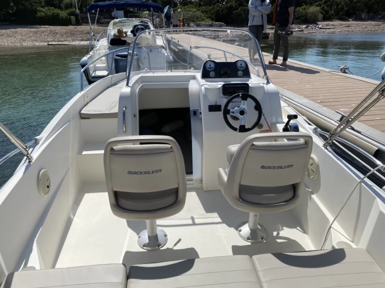 Quicksilver Activ 605 Sundeck charter bareboat or captained in  Port Camille Rayon