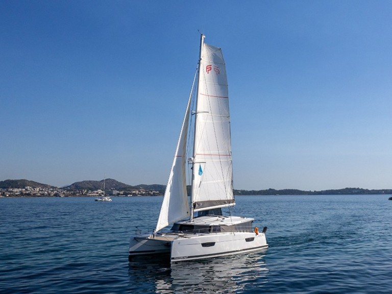 Fountaine Pajot Astrea 42 charter bareboat or captained in  Alimos