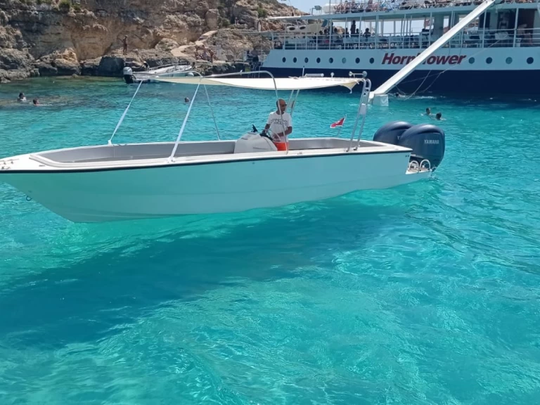 Crown Coronet charter bareboat or captained in  Xemxija