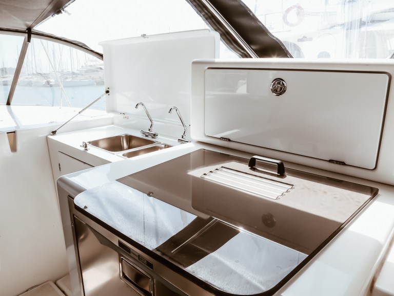 Jeanneau Sun Loft 47 charter bareboat or captained in  Punta Ala