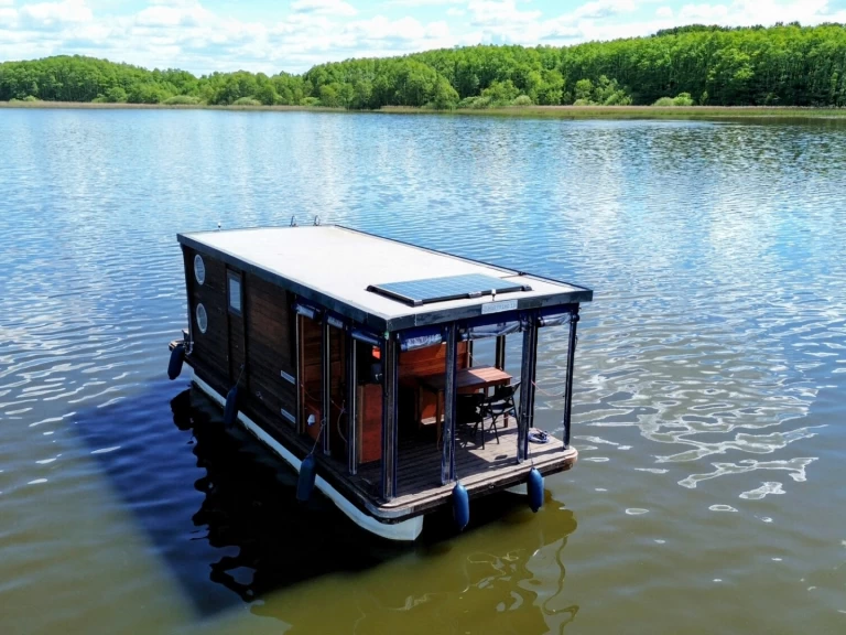 WOMA D 7 charter bareboat or captained in  Buchholz