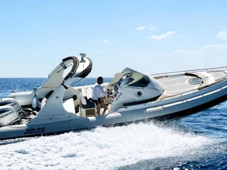 Joker Boat Wide 950 charter bareboat or captained in  Avola