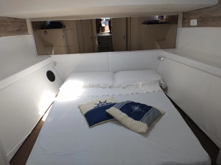 Motorboat for rent Porto Vallugola at the best price