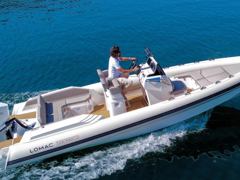 Lomac Turismo 7.0 charter bareboat or captained in  La Trinité-sur-Mer
