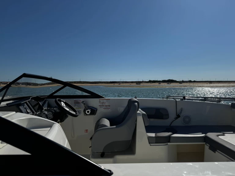 Bayliner VR6 OB charter bareboat or captained in  Faro