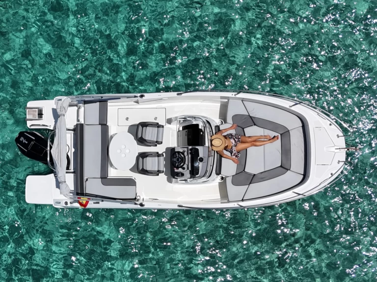 Jeanneau CAP CAMARAT 6,5 CC Style charter bareboat or captained in  Marina Botafoch