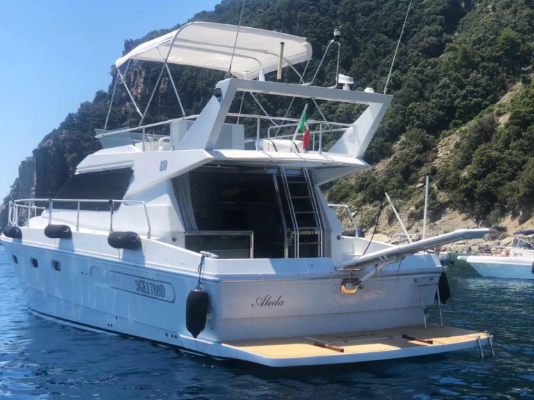 Motorboat rental with or without captain Ferretti Porto di Fertilia