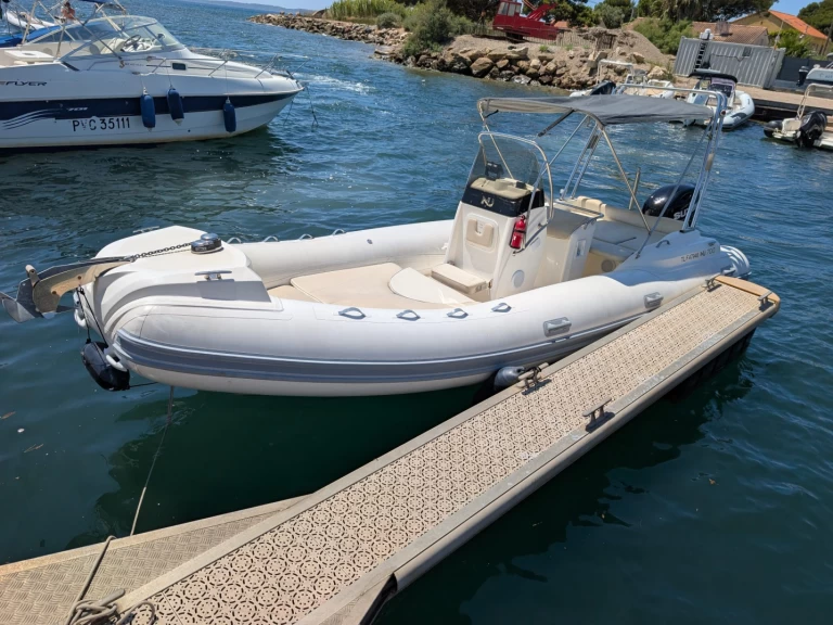 Nuova Jolly NJ 700 charter bareboat or captained in  Hyères