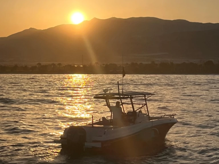Bareboat Rental Motorboat Pacific Craft with a boat licence