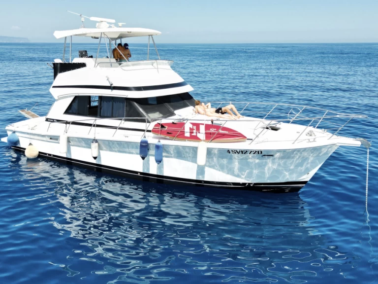 Riviera 43 open flybridge  charter bareboat or captained in  Alassio