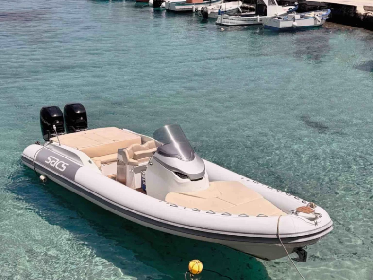 Sacs Strider 9 charter bareboat or captained in  Marsala