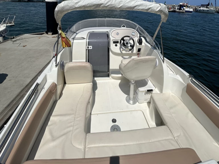 Jeanneau Leader 625 charter bareboat or captained in  Barcelona
