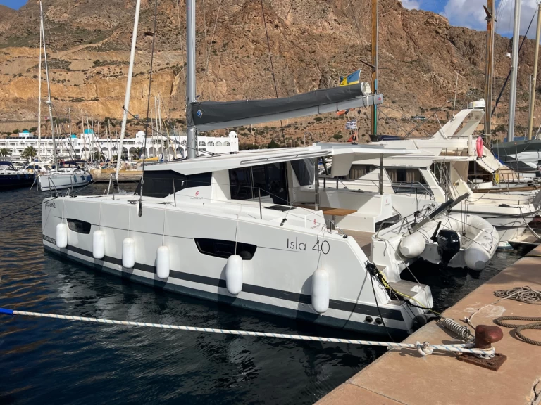 Fountaine Pajot Isla 40 charter bareboat or captained in  Sant Antoni de Portmany