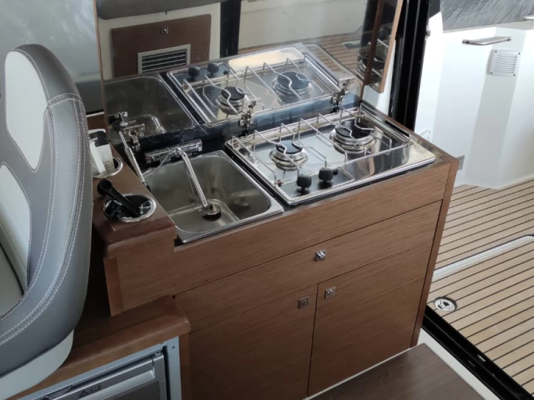 Jeanneau Merry Fisher 895 charter bareboat or captained in  Bacoli