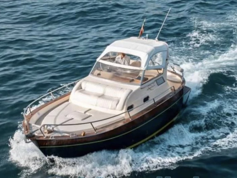 Acquaviva 30 EXE charter bareboat or captained in  Salerno