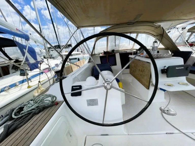 Dufour Dufour 410 Grand Large charter bareboat or captained in  Alimos