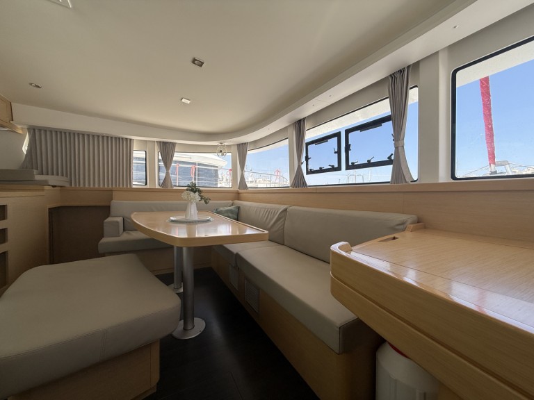 Boat rental Lagoon Lagoon 42, 2020,  Air Condition, Generator, Water maker, Solar panel, Only with skipper, 2 SUP offered free in Lefkáda on Samboat