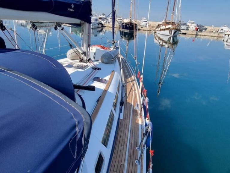 Jeanneau Sun Odyssey 42i charter bareboat or captained in  Syra