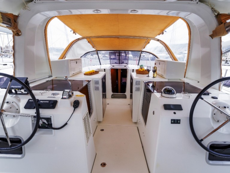 Jeanneau Sun Loft 47 charter bareboat or captained in  Néa Péramos