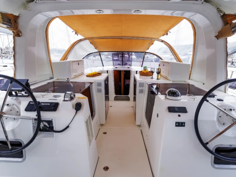 Jeanneau Sun Loft 47 charter bareboat or captained in  Néa Péramos