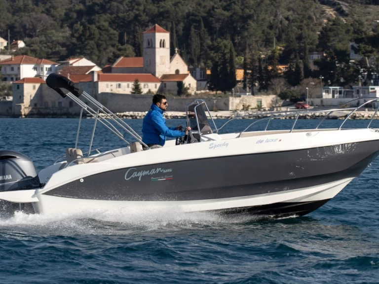 Cayman Deluxe charter bareboat or captained in  Milna