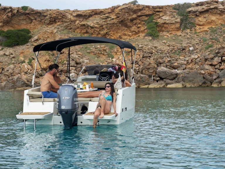 Nuva Nuva M6 charter bareboat or captained in  Fornells