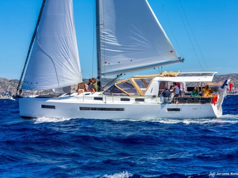 Jeanneau Sun Loft 47 charter bareboat or captained in  Alimos