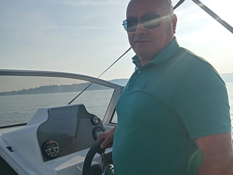 Manara Marine  620C charter bareboat or captained in  Moniga del Garda