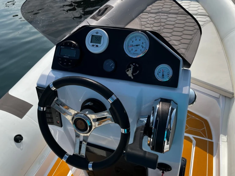 Oromarine Gravel-19 charter bareboat or captained in  Port d'Addaia (Port)