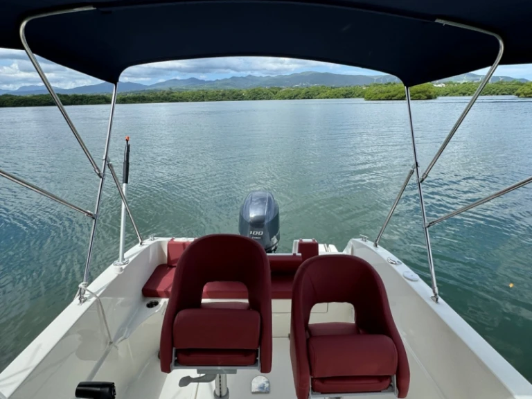 Bareboat Rental Motorboat Pacific Craft with a boat licence