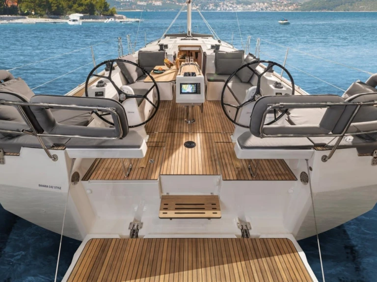 Bavaria Bavaria C42 charter bareboat or captained in  Ouistreham