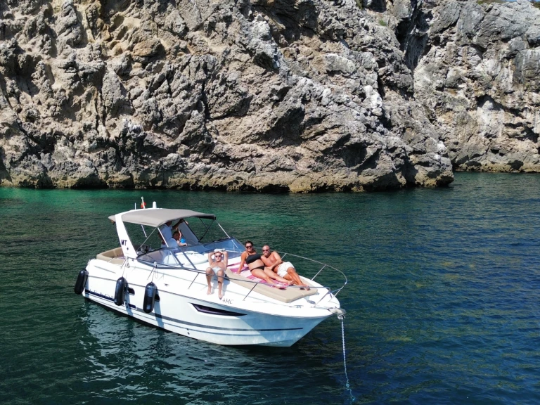 Jeanneau Leader 8 charter bareboat or captained in  Marina de Tróia