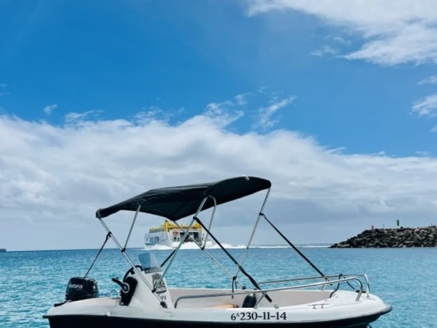 Astec FIBER 400 charter bareboat or captained in  Playa Blanca