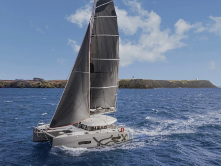 Excess Excess 11 (6 cab.) charter bareboat or captained in  Lefkáda