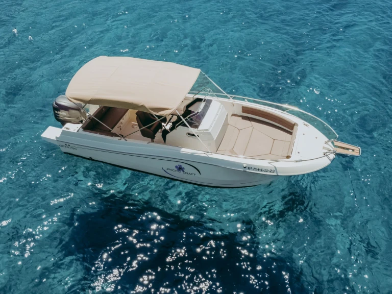 Pacific Craft sun cruiser 750 charter bareboat or captained in  Marina Santa Eulàlia