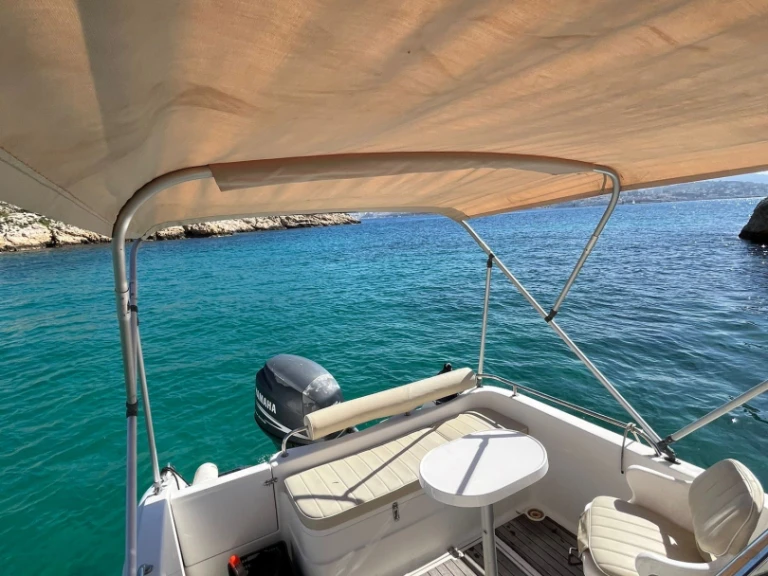 Bareboat Rental Motorboat Pacific Craft with a boat licence