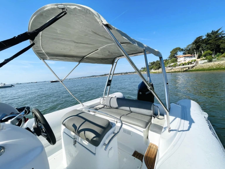 Lomac Lomac 760 IN charter bareboat or captained in  Lège-Cap-Ferret