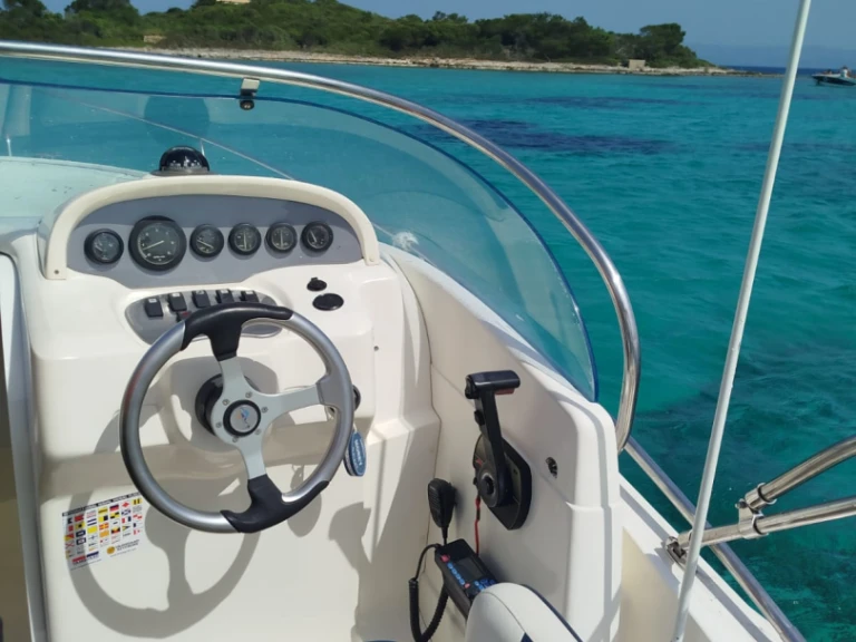 Rio Rio 750 Sol charter bareboat or captained in  Club Nàutic Ca'n Picafort