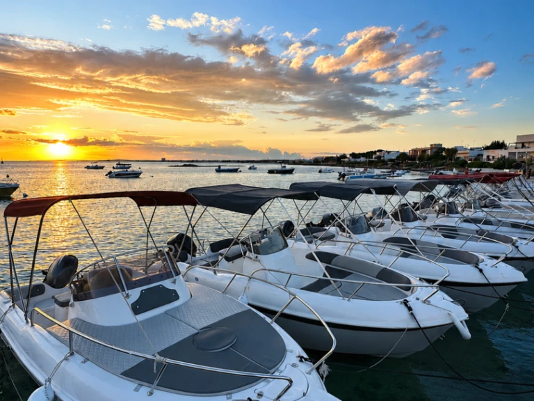 Albatros Open 5.65 charter bareboat or captained in  Porto Cesareo