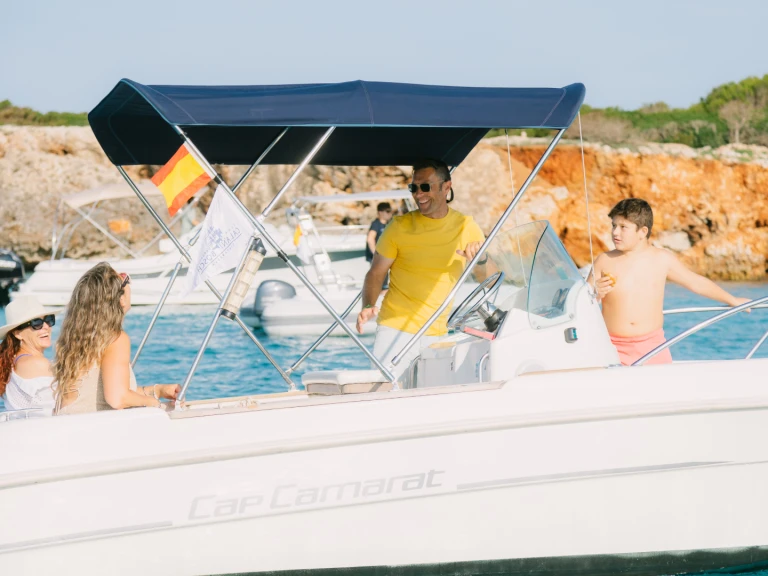 Jeanneau Cap Camarat 545 Open charter bareboat or captained in  Cala en Bosch