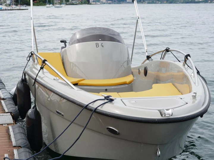 Clear Aries Open L charter bareboat or captained in  Angera