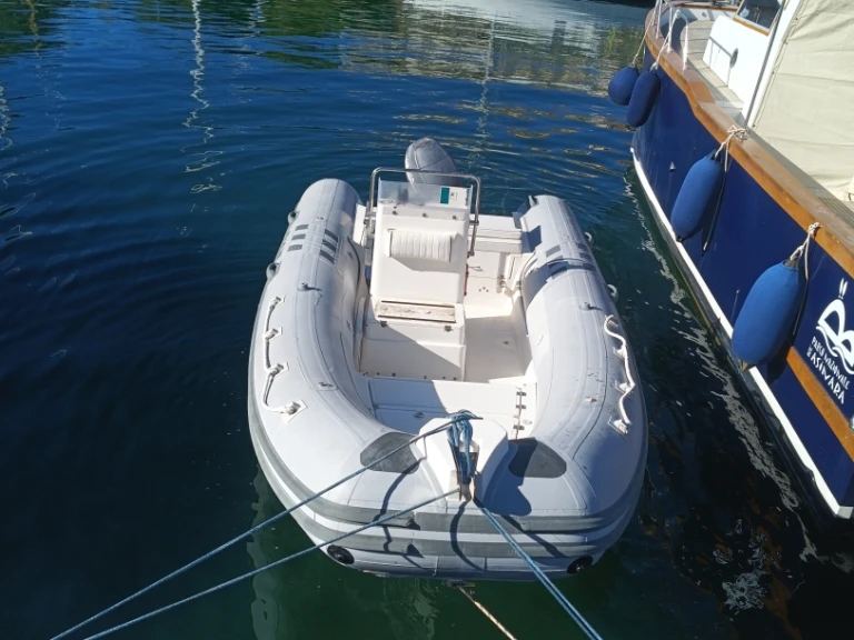 Bwa Bwa 550 charter bareboat or captained in  Stintino