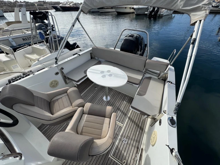 Jeanneau Cap Camarat 7.5 WA Serie 2 charter bareboat or captained in  Empuriabrava