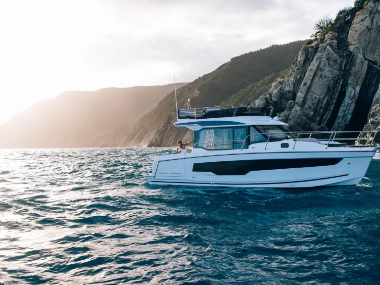 Jeanneau Merry Fisher 1095 Fly charter bareboat or captained in  Cannes