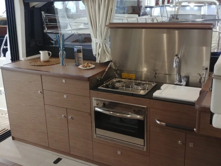 Jeanneau NC 14 charter bareboat or captained in  Bacoli