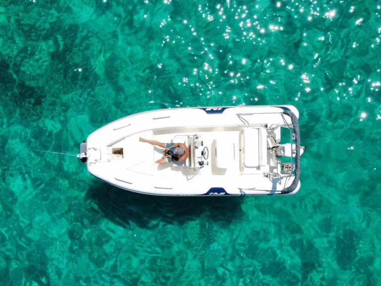 Boat rental Quicksilver Activ 595 Cruiser in Porto San Paolo on Samboat