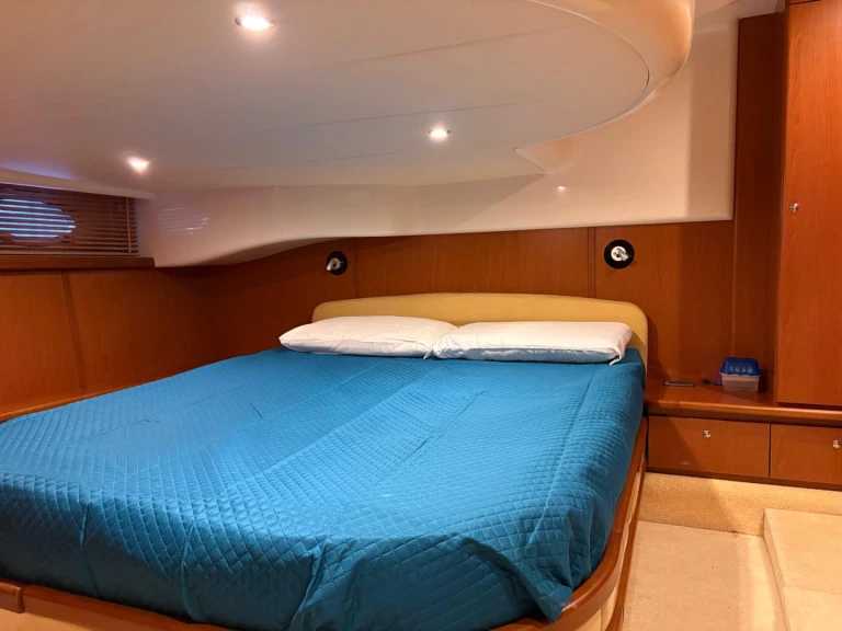 Azimut Atlantis 42 charter bareboat or captained in  San Teodoro