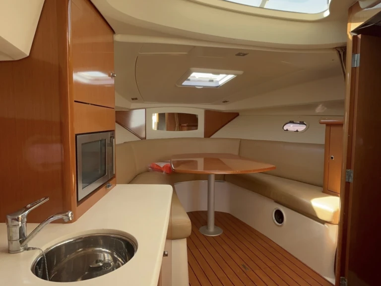 Jeanneau Prestige 30 S charter bareboat or captained in  Cannes