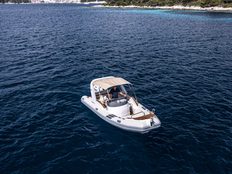 Aquamax B 23 F charter bareboat or captained in  Hvar